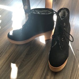 Ariana Bohling platform fur boots